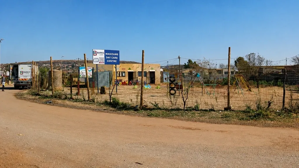 Barko Loans signage outside Masizame Day Care Centre in Orange Farm.